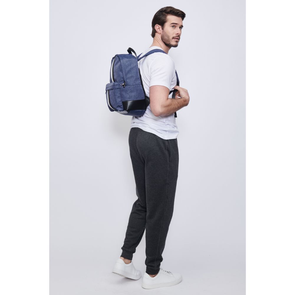 Man wearing Navy Porter & Bond Zeke Backpack 841764107211 View 4 | Navy